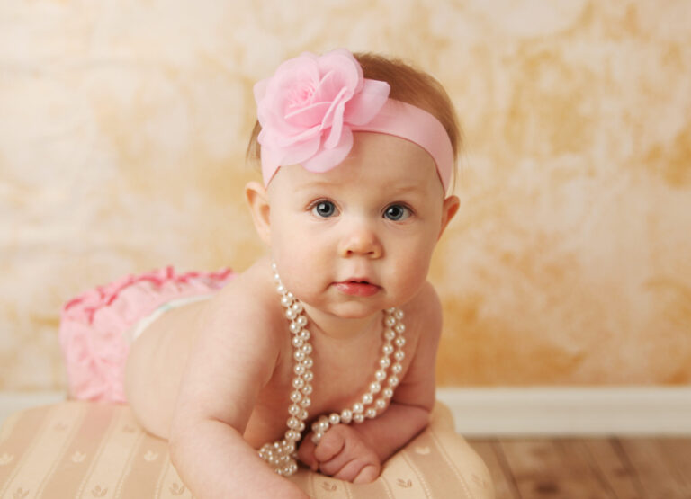 Adorable,Young,Baby,Girl,Wearing,A,Vintage,Pearl,Necklace,And